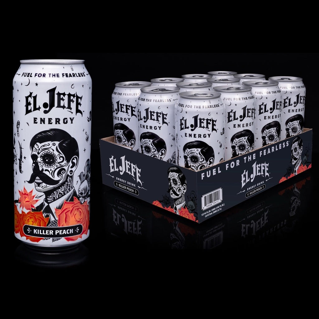 A single El Jefe Energy can of Killer Peach energy drink stands next to a twelve-pack cardboard tray on a glossy black reflective surface. The can is white with black gothic-style text and illustrations, including a sugar skull, and features red peach flower accents.